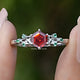 Front view of Sunstone Hexagon Cut Gemstone Accent Ring Set in two fingers 