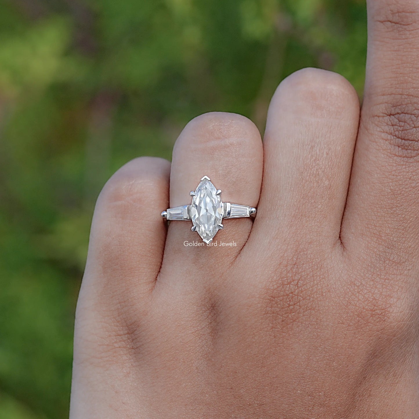 Top View Of Three Stone Old Mine Marquise Moissanite Ring