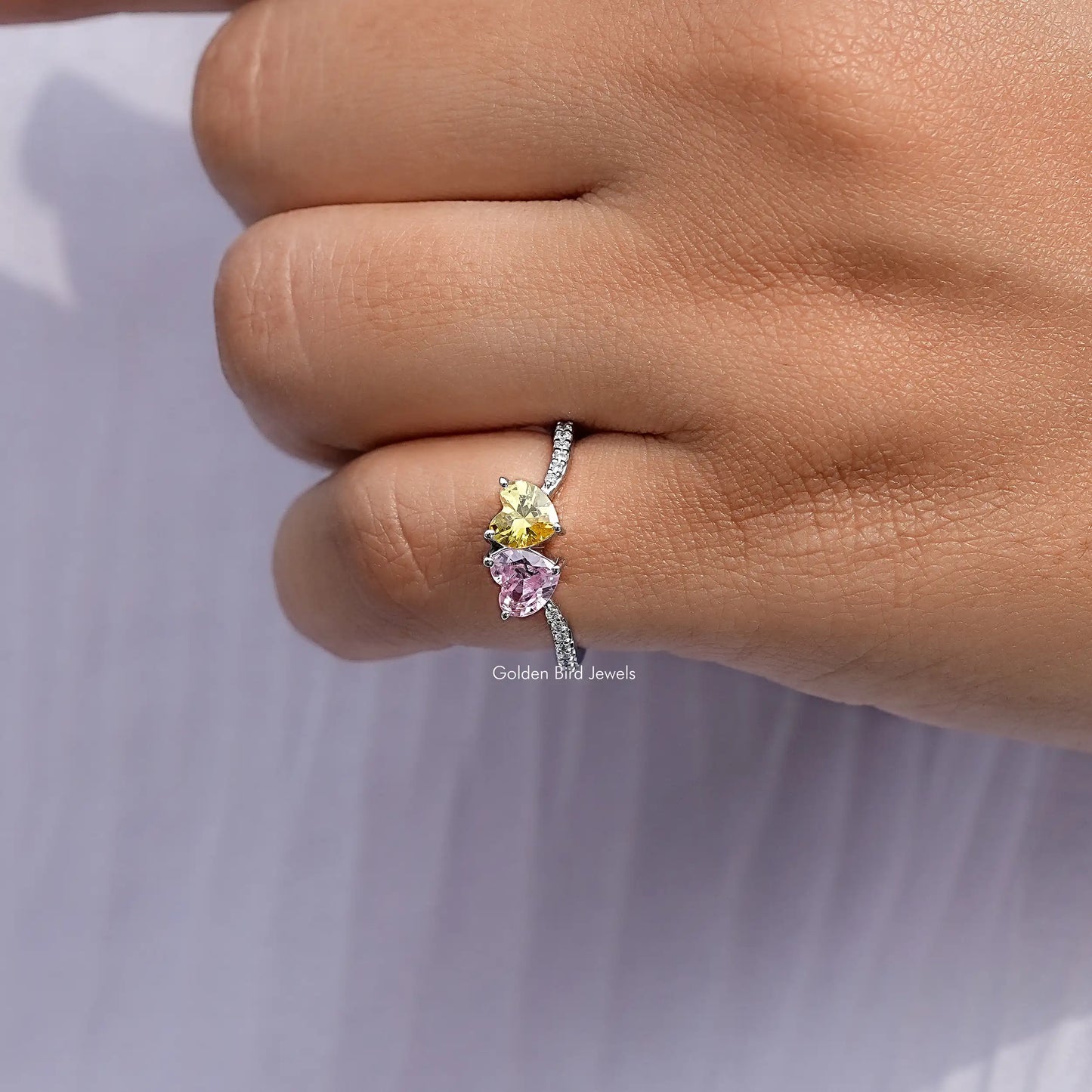 Close View Of Yellow And Pink Heart Ring 
