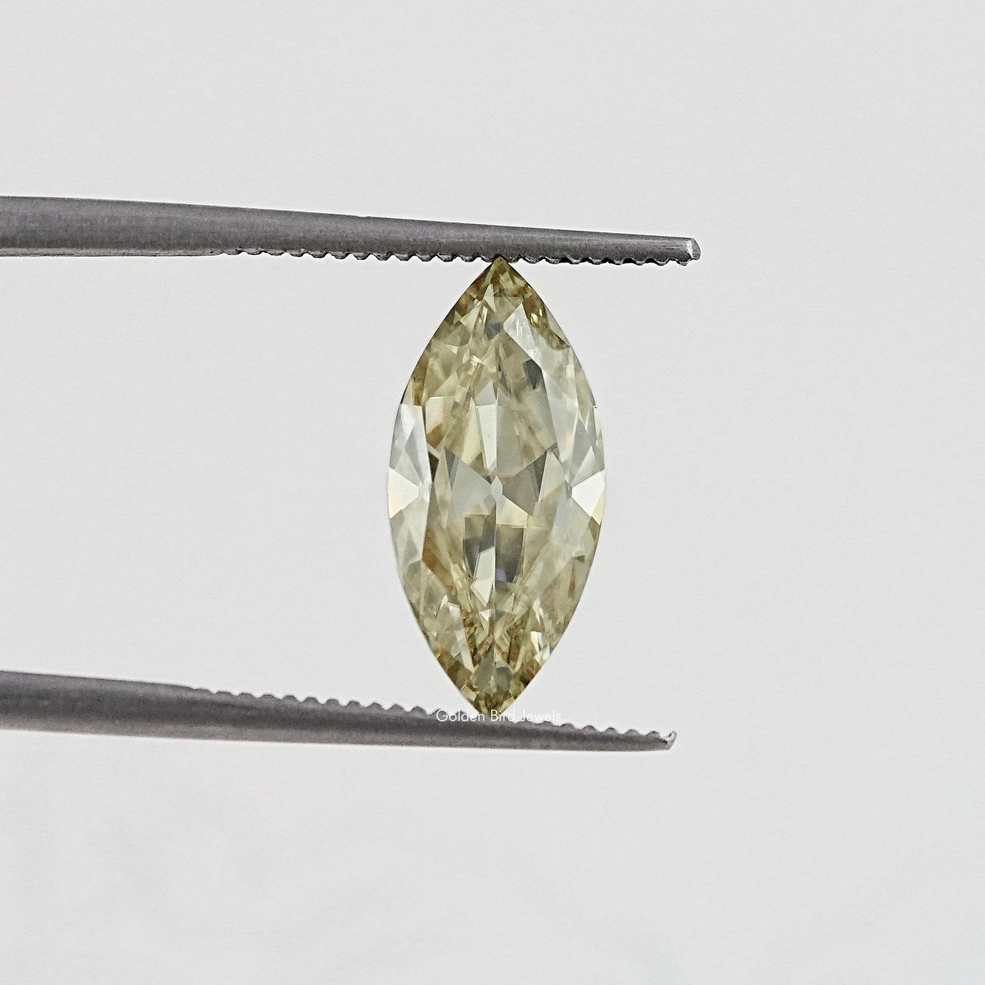 In Tweezer View Of Old Mine Marquise Cut Loose Moissanite Stone