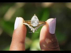 YouTube Video Of Pear Shaped Moissanite Bridal Ring With Curveed Band
