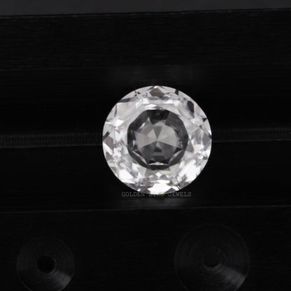Detailed View Of Colorless Rose Cut Round Loose